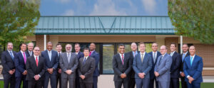Seaview Orthopaedics orthopedic specialists posing for a photo in front of one of their clinics in New Jersey. 